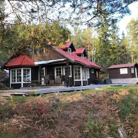 Telemark Cabin On A Small Island Bergan